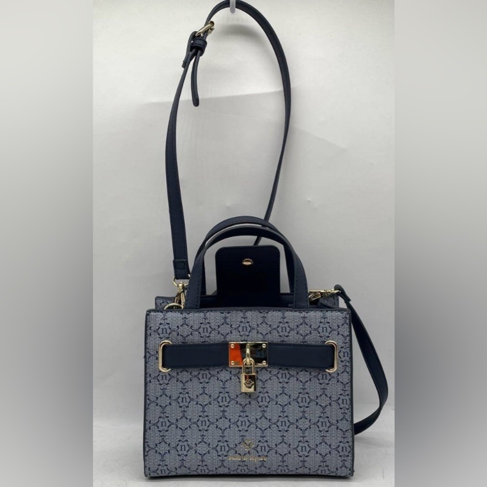 Nanette Lepore blue patterned bag with gold lock and accents